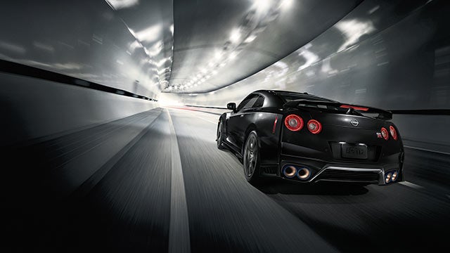 2023 Nissan GT-R seen from behind driving through a tunnel | Tony Nissan in Waipahu HI