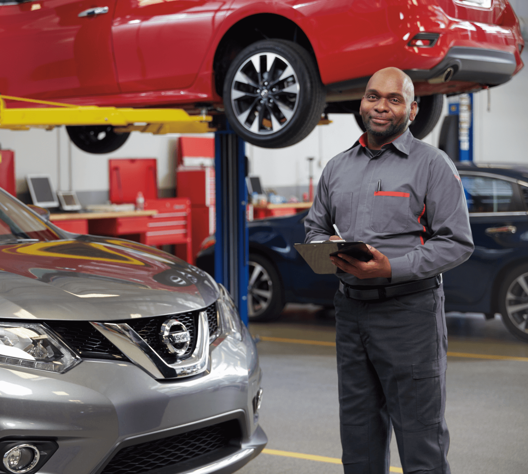 Smiling service tech in service center